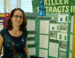 Eliza Mongeau explains her experiment, &ldquo;Killer Extracts,&rdquo; at the Good Hope Science and Engineering Fair.